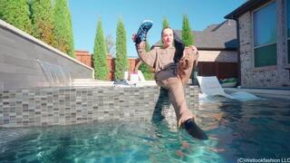 Mandi Falls in the Pool While Cleaning