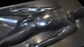 Sealed in the skintight black vacbed