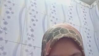 Toothbrushing indonisiand lady