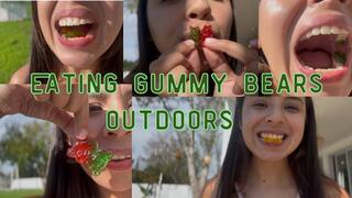Eating gummy bears outdoors