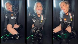 Sexy Ferrari Girl in Boots smokes marlboro red 100