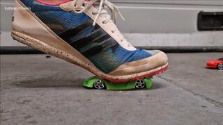 Kat Crushes Toy Cars Under Her Track Spike Trainers