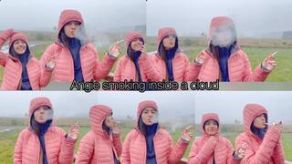 Angie smoking inside a cloud