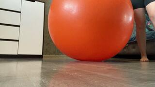 Valeri looner jump on big orange yogaball