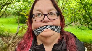 Helpless damsel tied to a tree