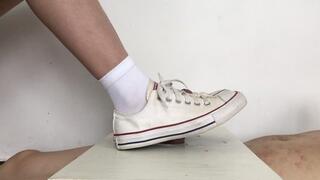 Cock under sneakers