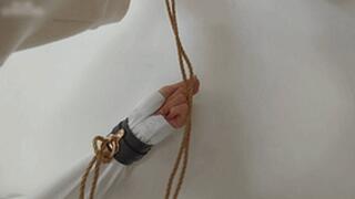 xy325-Petite cute Chinese girl is tied up with ropes in an iron ring on the wall