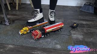 red and yellow tractor trailer crush