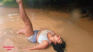 Wetlook Hair whipping in the mud, the sea and rain