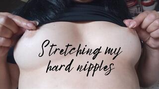 Stretching my hard nipples