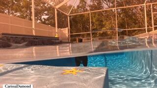 Carissa in the new black free dive fins and black neoprene suit