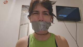 Taping my own mouth with grey tape