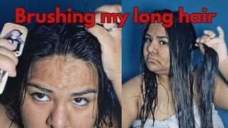 Brushing my long hair after getting out of the shower
