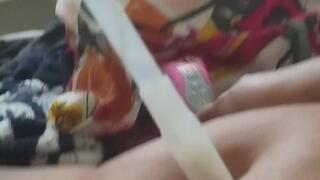 Lying down on my bed giving me pleasure alone