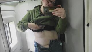 Molly shows it all in the bus bathroom