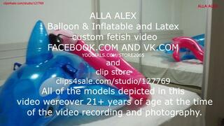 Alla deflates an inflatable blue whale and an inflatable bird