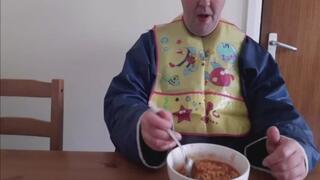 Adult Baby Makes his bib messy with Sketty hoops!