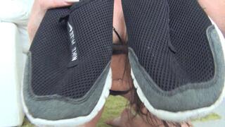 Cut up black summer sneakers a