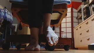 Giant Feet Under Desk