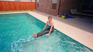 Kate Dives in the Pool Wearing a Black and Shiny Jumpsuit
