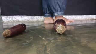 Bare feet of man crush and trample fruit (6)