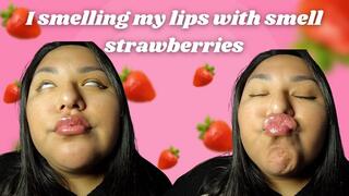 I smelling my lips with smell strawberries