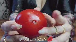 my very long natural nails playing and destroy a tomato