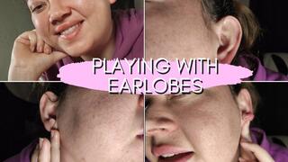 Massage with oil on earlobes