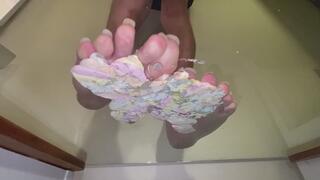 Barefoot marshmallow crush though glass