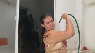 SUMMER GIRL HAS FUN WITH THE HOSE WATER