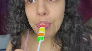 I suck and chew my lollipop with rich and provocative sounds