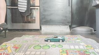 MissaRaeBerry toy car crush Ford Mustang Cobra in high heeels close ground view