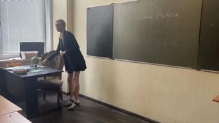 The teacher was teaching a lesson when she accidentally hit her toe on the table, she understands that she needs to finish the lesson, but it hurts for her to walk (reissue)