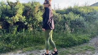 Girl stop to pee on hiking trail