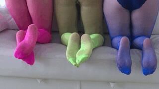 Playing legs in colorful fishnet tights FP