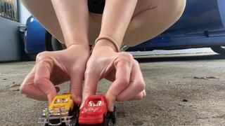 Crushing: toy cars, cans on gravel