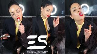Smoking in a blazer, tie and pvc leggins