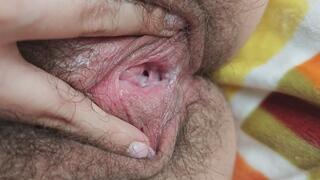 Hairy and wet pussy closeup
