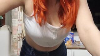 Lighting a cigarette on the stove, smoking in the kitchen