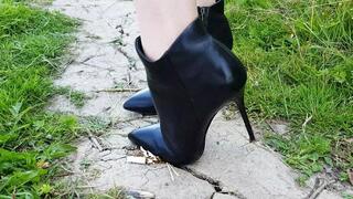 cigarettes crush by high heels, trample on cigarettes, put out the cigarette with high heels, smoking girl
