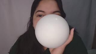 Fat girl plays with balloons