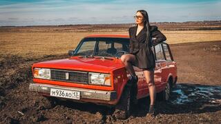 CAR STUCK Sales rep gets stuck in mud on farm