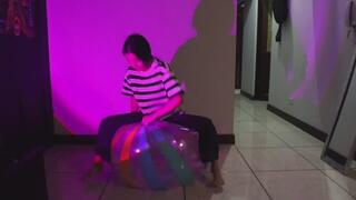 Akina deflates beach ball