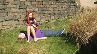 Sophie Sits On Her Slave Near The Castle