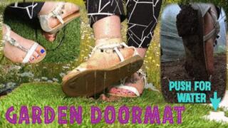 CC - The human garden doormat, flat sandals