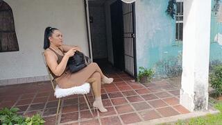 She pumps the pedals of the antique car as she tries to start it (2)