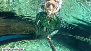 Carissa snorkeling and freediving in the spring in the crocodile catsuit