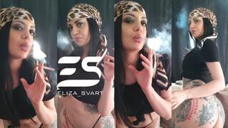 Smoking on a hot Summer evening in a shirt, bandana and string