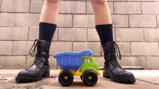Crushing Toy Truck - Combat Boots - Close-up