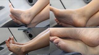 Amazing hot arched wrinjkled barefeet on seat